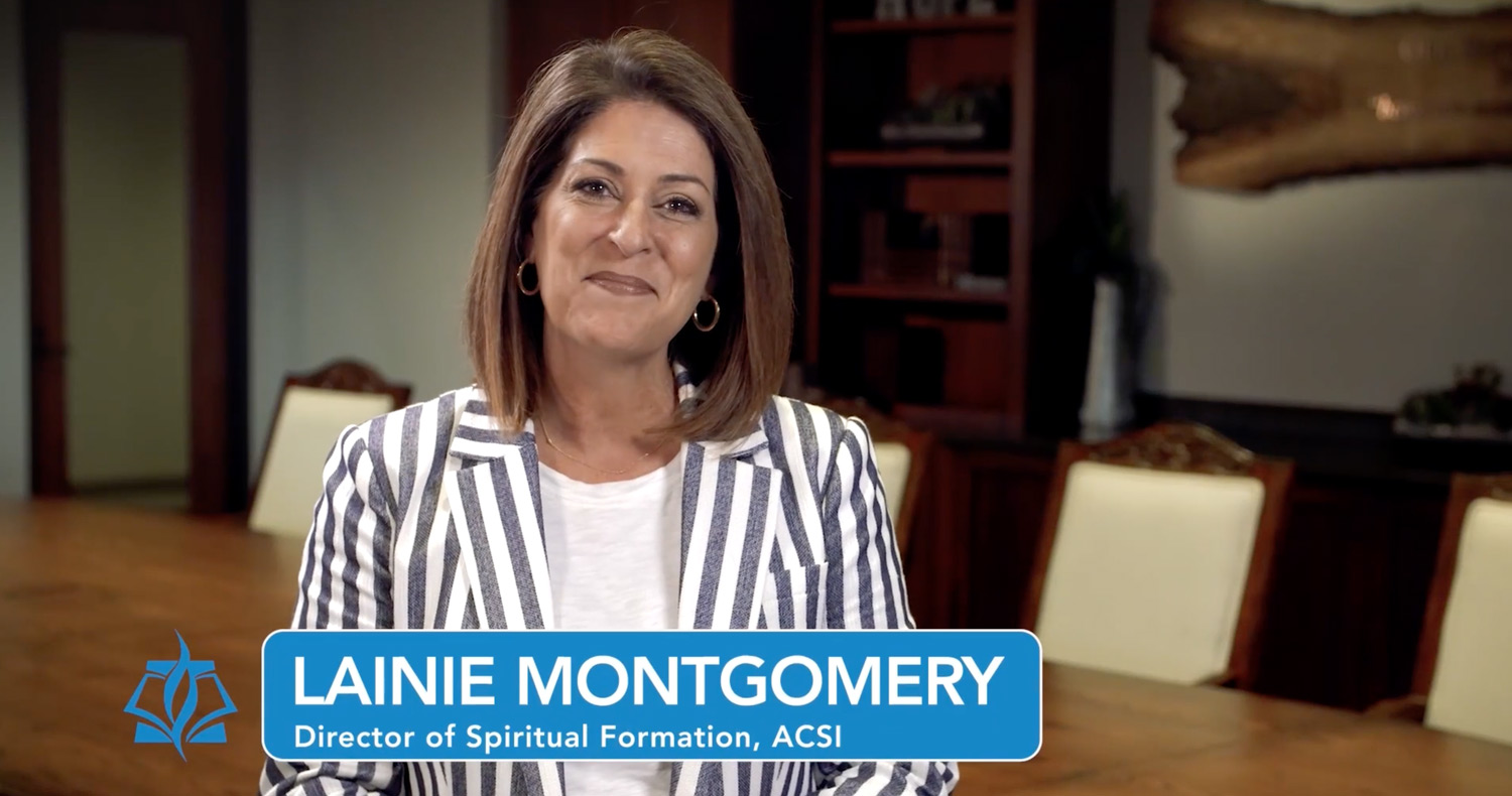 Woman with brown hair talks to the camera.